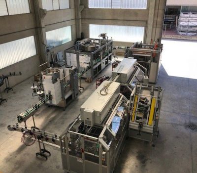 A complete line of carbonation machines working